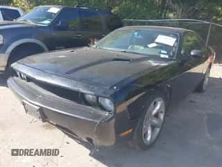2014 Dodge Challenger SXT с VIN 2C3CDYAG3EH257611, выставлен на аукционе IAAI как лот 43549347 с пробегом 143 540 миль миль и . История ставок и продаж доступна на DreamBid. Изображение 2.