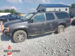 2011 Chevrolet Suburban LT с VIN 1GNSKJE30BR230557, выставлен на аукционе Copart как лот 68154565 с пробегом Не указан миль и Списание • Salvage title. История ставок и продаж доступна на DreamBid. Изображение 1.