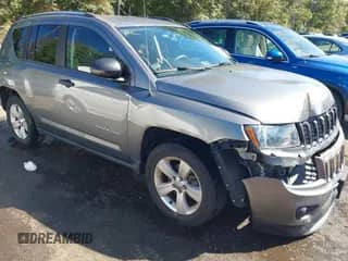 2014 Jeep Compass Sport with VIN 1C4NJDBB1ED607601, listed as a IAAI auction lot 43329852 with 135,237 mi miles and . Bid and sale history available at DreamBid. Image 1.