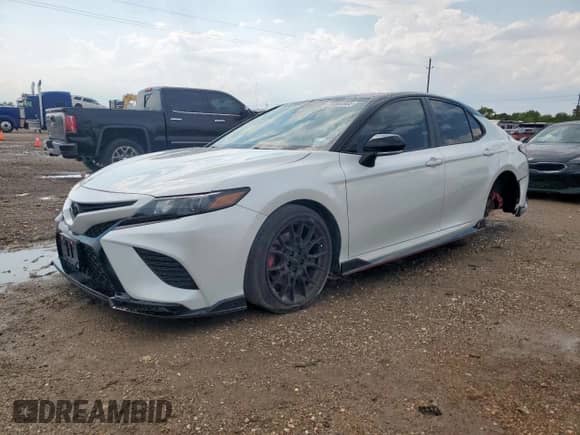 2023 Toyota Camry TRD with VIN 4T1KZ1AK6PU075949, listed as a Copart auction lot 70565865 with 52,356 mi miles and Salvage title. Bid and sale history available at DreamBid. Image 1.