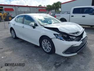 2021 Toyota Camry LE with VIN 4T1C11AK8MU601313, listed as a IAAI auction lot 43383218 with 34,384 mi miles and . Bid and sale history available at DreamBid. Image 1.