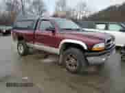 2003 Dodge Dakota с VIN 1D7GG46X33S363431, выставлен на аукционе Copart как лот 79881084 с пробегом 177 109 миль миль и Списание • Salvage title. История ставок и продаж доступна на DreamBid. Изображение 4.