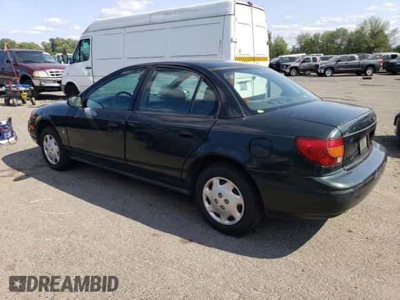 2000 Saturn SL with VIN 1G8ZG5287YZ109866, listed as a Copart auction lot 64703644 with 146,163 mi miles and Clean title. Bid and sale history available at DreamBid. Image 2.