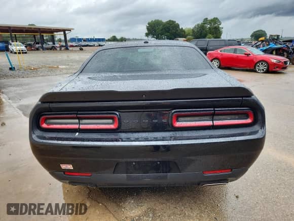 2023 Dodge Challenger SXT with VIN 2C3CDZAGXPH574116, listed as a Copart auction lot 82169465 with 54,003 mi miles and Clean title. Bid and sale history available at DreamBid. Image 6.