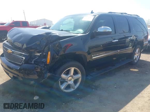 2009 Chevrolet Suburban LTZ z VIN 1GNFK36359R219818, wystawiony jako IAAI lot #42120323 z przebiegiem 146 999 mil mil oraz . Historia ofert i sprzedaży dostępna na DreamBid. Obrazek 17.