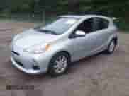 2013 Toyota Prius One z VIN JTDKDTB3XD1051060, wystawiony jako IAAI lot #42851670 z przebiegiem 163 017 mil mil oraz . Historia ofert i sprzedaży dostępna na DreamBid. Obrazek 2.