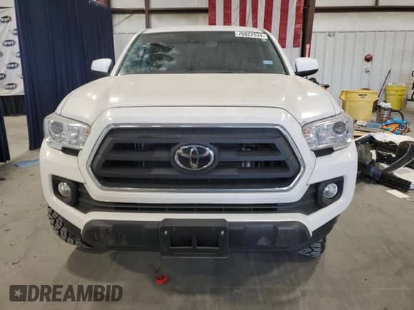 2023 Toyota Tacoma SR5 with VIN 3TYAZ5CN2PT042244, listed as a Copart auction lot 76022534 with 9,551 mi miles and Salvage title. Bid and sale history available at DreamBid. Image 5.