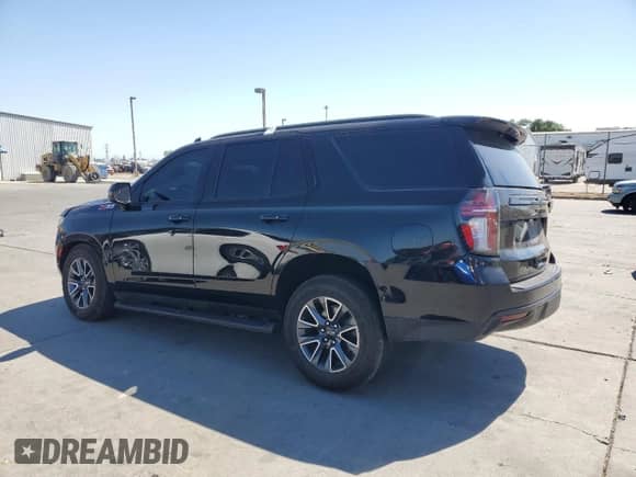 2023 Chevrolet Tahoe Z71 with VIN 1GNSKPKD1PR332098, listed as a Copart auction lot 64883395 with 72,453 mi miles and Salvage title. Bid and sale history available at DreamBid. Image 2.