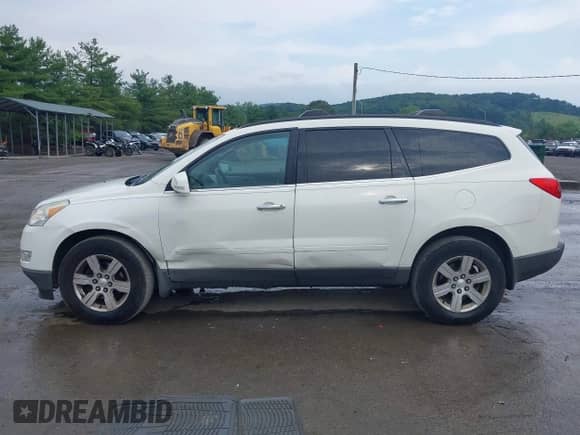 2012 Chevrolet Traverse 1LT with VIN 1GNKRGED9CJ283412, listed as a IAAI auction lot 42828479 with 189,000 mi miles and . Bid and sale history available at DreamBid. Image 14.