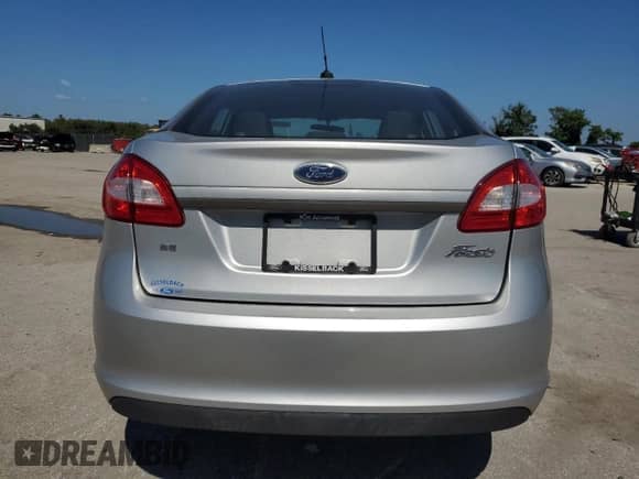 2012 Ford Fiesta SE с VIN 3FADP4BJ6CM169991, выставлен на аукционе Copart как лот 81459255 с пробегом 19 614 миль миль и Списание • Salvage title. История ставок и продаж доступна на DreamBid. Изображение 6.