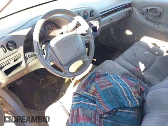 1997 Chevrolet Lumina with VIN 2G1WL52M1V9105473, listed as a IAAI auction lot 41411110 with 111,036 mi miles and . Bid and sale history available at DreamBid. Image 15.