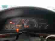 1994 Chevrolet Camaro Z28 z VIN 2G1FP22P4R2105947, wystawiony jako Copart lot #85064294 z przebiegiem 131 315 mil mil oraz Szkoda całkowita • Salvage title. Historia ofert i sprzedaży dostępna na DreamBid. Obrazek 9.