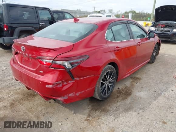 2022 Toyota Camry SE with VIN 4T1G11AK7NU033834, listed as a IAAI auction lot 43482726 with 113,850 mi miles and . Bid and sale history available at DreamBid. Image 4.