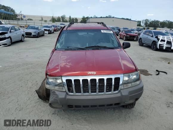 2002 Jeep Grand Cherokee Sport with VIN 1J4GW38S72C252344, listed as a Copart auction lot 61769485 with 306,152 mi miles and Salvage title. Bid and sale history available at DreamBid. Image 5.