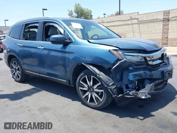 2021 Honda Pilot Touring 7-Passenger z VIN 5FNYF5H63MB039129, wystawiony jako IAAI lot #42455224 z przebiegiem Nie podano mil oraz . Historia ofert i sprzedaży dostępna na DreamBid. Obrazek 12.