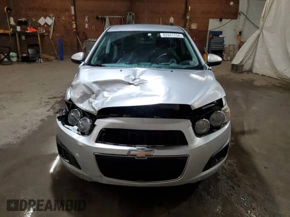 2014 Chevrolet Sonic LS с VIN 1G1JB5SH9E4230496, выставлен на аукционе Copart как лот 82441734 с пробегом 143 628 миль миль и Списание • Salvage title. История ставок и продаж доступна на DreamBid. Изображение 5.