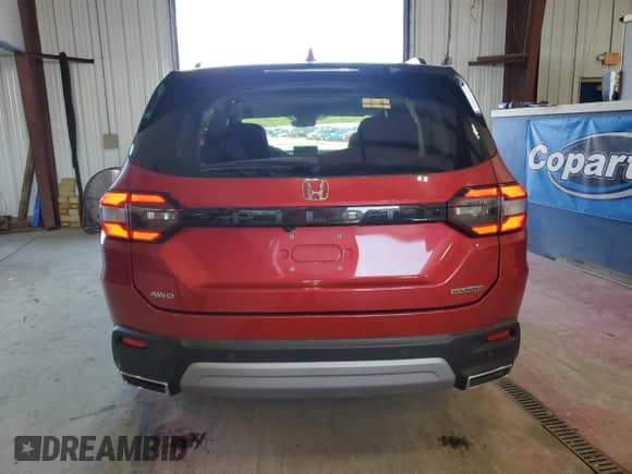 2023 Honda Pilot Touring with VIN 5FNYG1H73PB023953, listed as a Copart auction lot 70050455 with 45,315 mi miles and Salvage title. Bid and sale history available at DreamBid. Image 6.