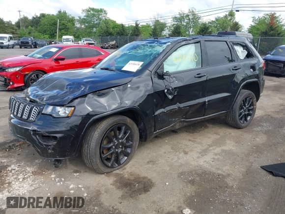 2021 Jeep Grand Cherokee Laredo X with VIN 1C4RJFAG6MC623212, listed as a IAAI auction lot 42190470 with 57,888 mi miles and . Bid and sale history available at DreamBid. Image 18.