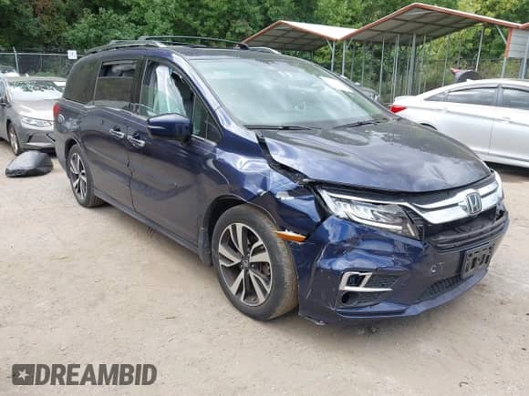 2018 Honda Odyssey Elite with VIN 5FNRL6H92JB030933, listed as a IAAI auction lot 43397917 with 74,671 mi miles and . Bid and sale history available at DreamBid. Image 1.