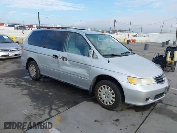 2004 Honda Odyssey LX with VIN 5FNRL18524B042391, listed as a IAAI auction lot 43280655 with 165,252 mi miles and . Bid and sale history available at DreamBid. Image 1.