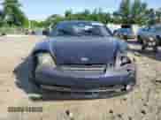 2004 Hyundai Tiburon with VIN KMHHM65D74U139333, listed as a Copart auction lot 61754235 with Not provided miles and Salvage title. Bid and sale history available at DreamBid. Image 5.