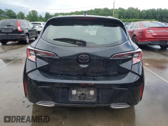 2022 Toyota Corolla XSE with VIN JTNC4MBE1N3165512, listed as a Copart auction lot 60106665 with 44,311 mi miles and Salvage title. Bid and sale history available at DreamBid. Image 6.