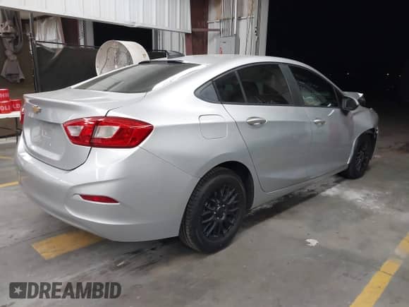 2018 Chevrolet Cruze LS with VIN 1G1BC5SM7J7144238, listed as a IAAI auction lot 43270084 with 108,293 mi miles and . Bid and sale history available at DreamBid. Image 4.