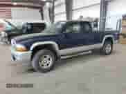 2003 Dodge Dakota SLT z VIN 1D7HG42N13S111122, wystawiony jako Copart lot #65447505 z przebiegiem 89 870 mil mil oraz Szkoda całkowita • Salvage title. Historia ofert i sprzedaży dostępna na DreamBid. Obrazek 1.
