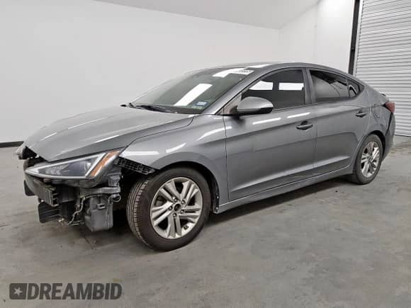 2019 Hyundai Elantra Value Edition z VIN KMHD84LF6KU771703, wystawiony jako Copart lot #83842235 z przebiegiem 149 993 mil mil oraz Czysty tytuł • Clean title. Historia ofert i sprzedaży dostępna na DreamBid. Obrazek 1.