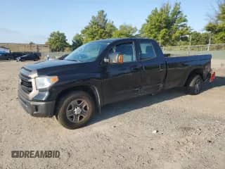 2016 Toyota Tundra SR with VIN 5TFCY5F15GX020118, listed as a Copart auction lot 74260754 with 226,143 mi miles and Salvage title. Bid and sale history available at DreamBid. Image 1.