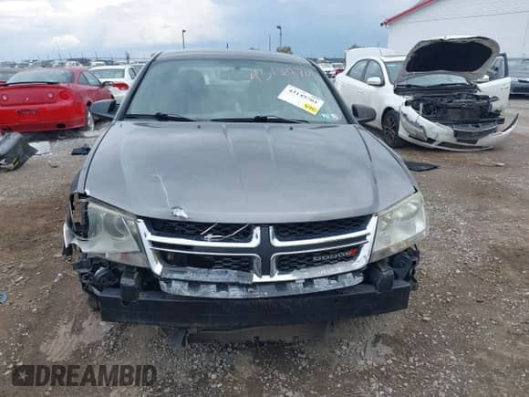 2013 Dodge Avenger SE z VIN 1C3CDZAB7DN654061, wystawiony jako IAAI lot #43149701 z przebiegiem 145 190 mil mil oraz . Historia ofert i sprzedaży dostępna na DreamBid. Obrazek 12.