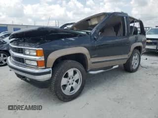 1999 Chevrolet Tahoe с VIN 3GNEK18R0XG106650, выставлен на аукционе Copart как лот 63455944 с пробегом 158 146 миль миль и На запчасти • Non repairable. История ставок и продаж доступна на DreamBid. Изображение 1.