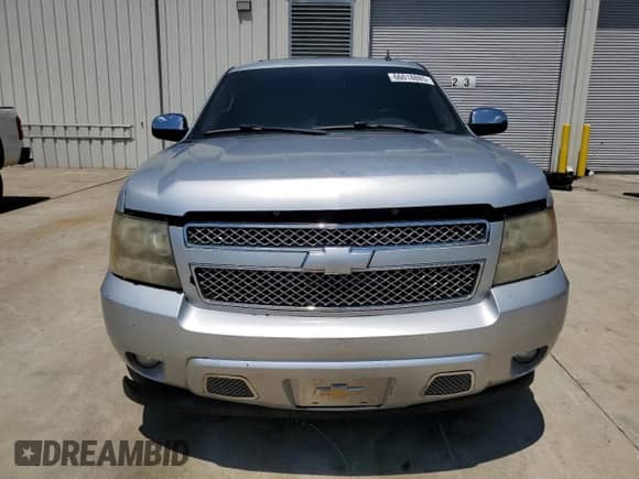 2012 Chevrolet Tahoe LT with VIN 1GNSCBE09CR221365, listed as a Copart auction lot 66018885 with 165,236 mi miles and Salvage title. Bid and sale history available at DreamBid. Image 5.