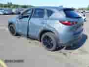 2025 Mazda CX-5 S Carbon Edition z VIN JM3KFBCM0S0575730, wystawiony jako IAAI lot #42685414 z przebiegiem Nie podano mil oraz . Historia ofert i sprzedaży dostępna na DreamBid. Obrazek 3.