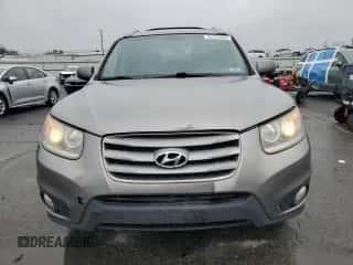 2012 Hyundai Santa Fe SE с VIN 5XYZH4AG3CG132283, выставлен на аукционе Copart как лот 82375095 с пробегом 195 340 миль миль и Списание • Salvage title. История ставок и продаж доступна на DreamBid. Изображение 5.