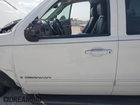 2009 GMC Sierra 1500 SLT with VIN 1GTEK39049Z231982, listed as a Copart auction lot 80354195 with 129,631 mi miles and Salvage title. Bid and sale history available at DreamBid. Image 7.
