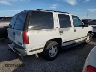 1996 Chevrolet Tahoe с VIN 1GNEC13R8TJ421533, выставлен на аукционе Copart как лот 76129824 с пробегом 190 015 миль миль и На запчасти • Non repairable. История ставок и продаж доступна на DreamBid. Изображение 3.