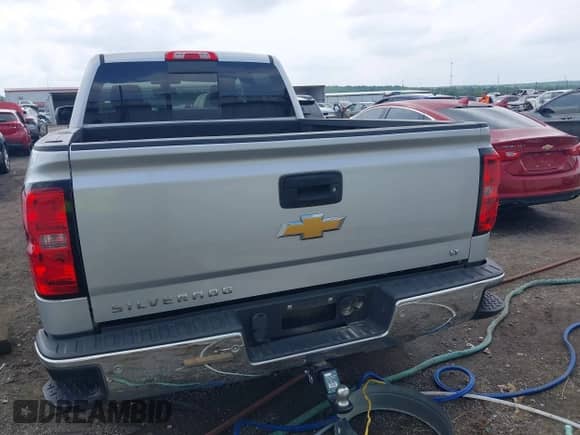2014 Chevrolet Silverado 1500 LT with VIN 1GCUKREC6EF194475, listed as a IAAI auction lot 42390790 with 165,802 mi miles and . Bid and sale history available at DreamBid. Image 16.