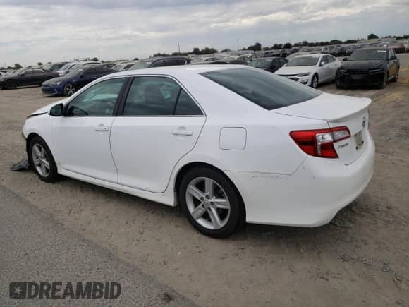 2012 Toyota Camry XLE z VIN 4T1BF1FK4CU199584, wystawiony jako Copart lot #82131075 z przebiegiem 173 940 mil mil oraz Szkoda całkowita • Salvage title. Historia ofert i sprzedaży dostępna na DreamBid. Obrazek 2.