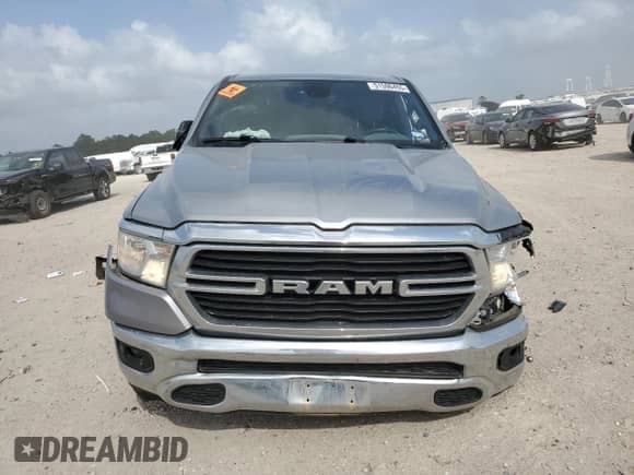 2021 Ram 1500 Lone Star z VIN 1C6RREMT0MN750111, wystawiony jako Copart lot #51590455 z przebiegiem 124 581 mil mil oraz Szkoda całkowita • Salvage title. Historia ofert i sprzedaży dostępna na DreamBid. Obrazek 5.