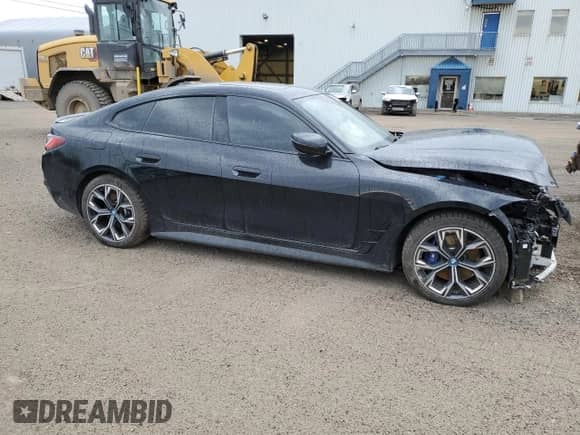2024 BMW i4 eDrive40 с VIN WBY73AW08RFS56480, выставлен на аукционе Copart как лот 56671815 с пробегом 15 859 миль миль и Списание • Salvage title. История ставок и продаж доступна на DreamBid. Изображение 4.