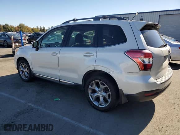 2015 Subaru Forester Touring with VIN JF2SJAUC5FH401331, listed as a Copart auction lot 82628925 with 134,059 mi miles and Clean title. Bid and sale history available at DreamBid. Image 2.