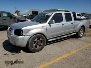 2004 Nissan Frontier SC with VIN 1N6MD29Y84C446845, listed as a Copart auction lot 73945614 with 126,183 mi miles and Salvage title. Bid and sale history available at DreamBid. Image 1.