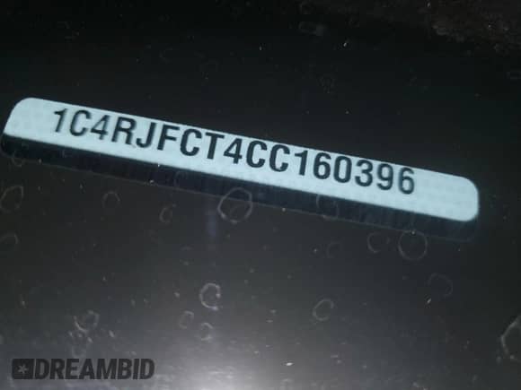 2012 Jeep Grand Cherokee Overland with VIN 1C4RJFCT4CC160396, listed as a Copart auction lot 71516165 with 135,574 mi miles and Salvage title. Bid and sale history available at DreamBid. Image 14.
