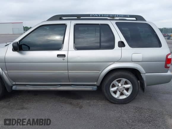 2004 Nissan Pathfinder SE with VIN JN8DR09XX4W806281, listed as a IAAI auction lot 42411982 with 259,921 mi miles and . Bid and sale history available at DreamBid. Image 16.