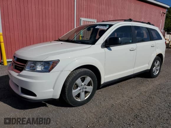 2015 Dodge Journey SE with VIN 3C4PDCAB3FT602617, listed as a Copart auction lot 81873125 with 243,830 mi miles and Clean title. Bid and sale history available at DreamBid. Image 1.