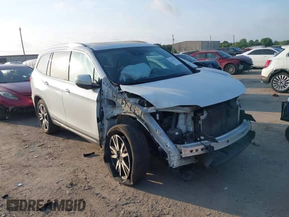 2020 Honda Pilot Elite with VIN 5FNYF6H05LB028181, listed as a IAAI auction lot 42351415 with 78,437 mi miles and . Bid and sale history available at DreamBid. Image 1.