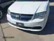 2014 Dodge Grand Caravan SXT z VIN 2C4RDGCG0ER201018, wystawiony jako IAAI lot #43501553 z przebiegiem 165 638 mil mil oraz . Historia ofert i sprzedaży dostępna na DreamBid. Obrazek 6.