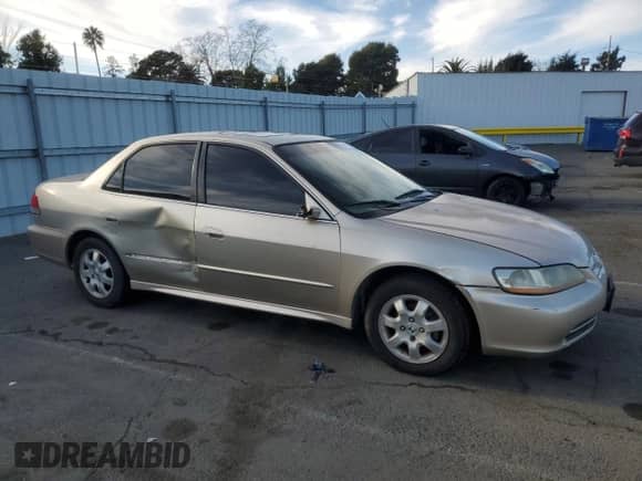 2002 Honda Accord EX with VIN JHMCG66012C002097, listed as a Copart auction lot 41604385 with 235,329 mi miles and Clean title. Bid and sale history available at DreamBid. Image 4.