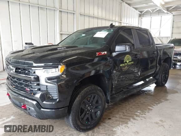 2024 Chevrolet Silverado 1500 LT Trail Boss with VIN 3GCUDFE83RG309753, listed as a IAAI auction lot 43305258 with 28,478 mi miles and . Bid and sale history available at DreamBid. Image 2.